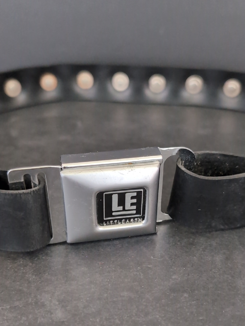 LE,WWW.Littlearth.com Bottle Cap Belt with Seatbelt Buckel.
